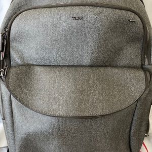 Tumi gray back pack